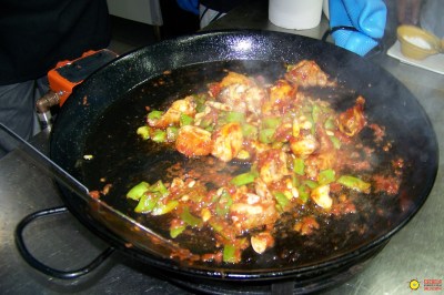 Quickly mix everything once the paprika goes in